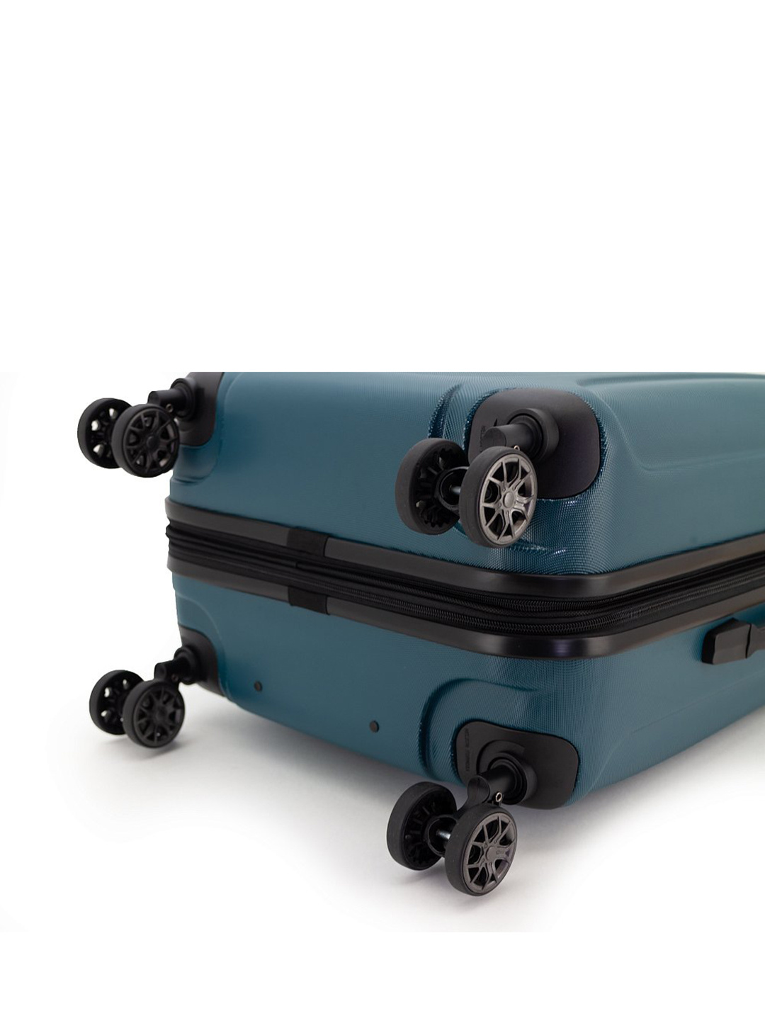 Фото Большой чемодан на двойных колесах с амортизаторами из коллекции Enigma Чемоданы