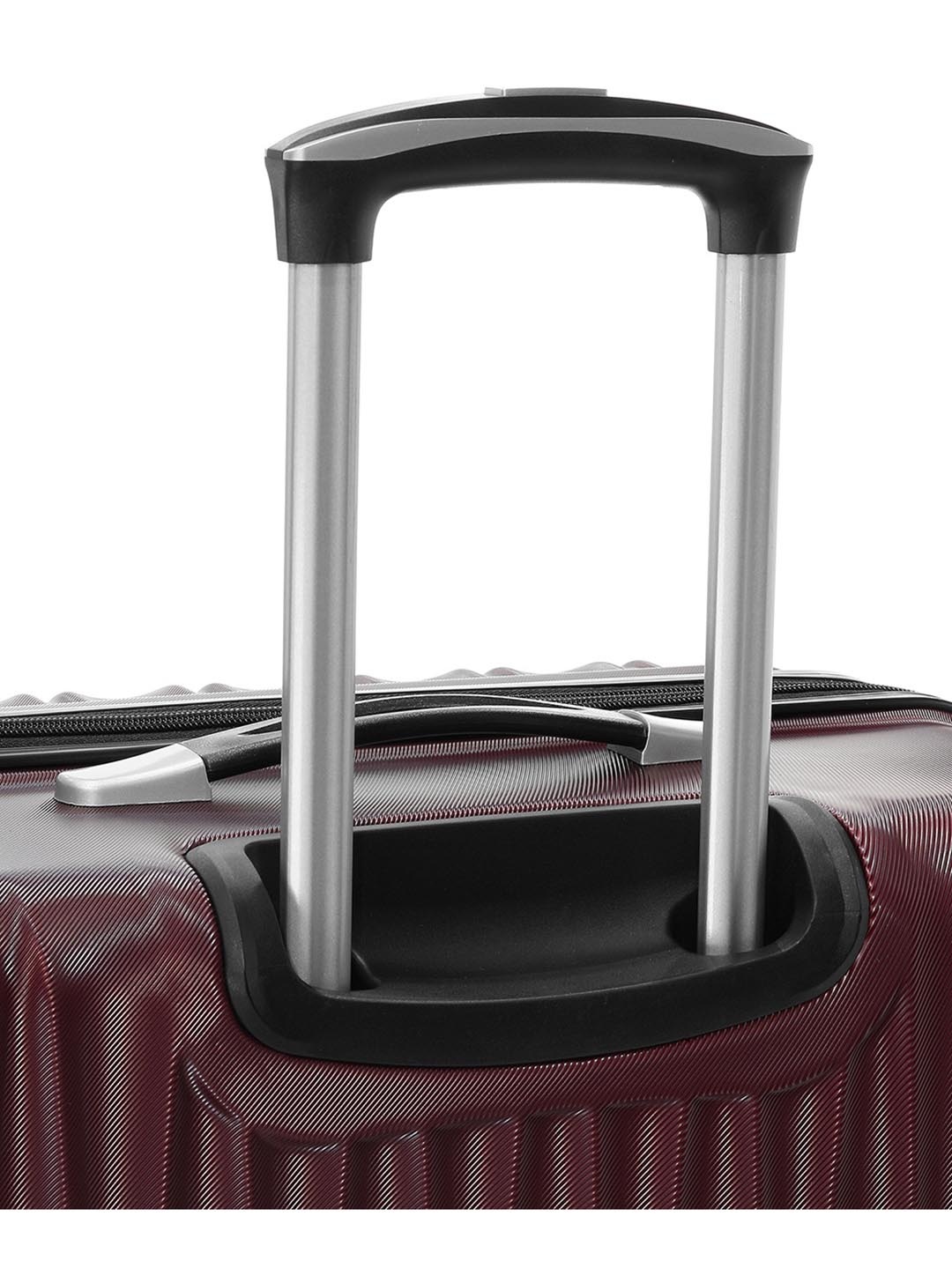 Фото Большой чемодан на колесах из рифленого ABS пластика бордового цвета Чемоданы
