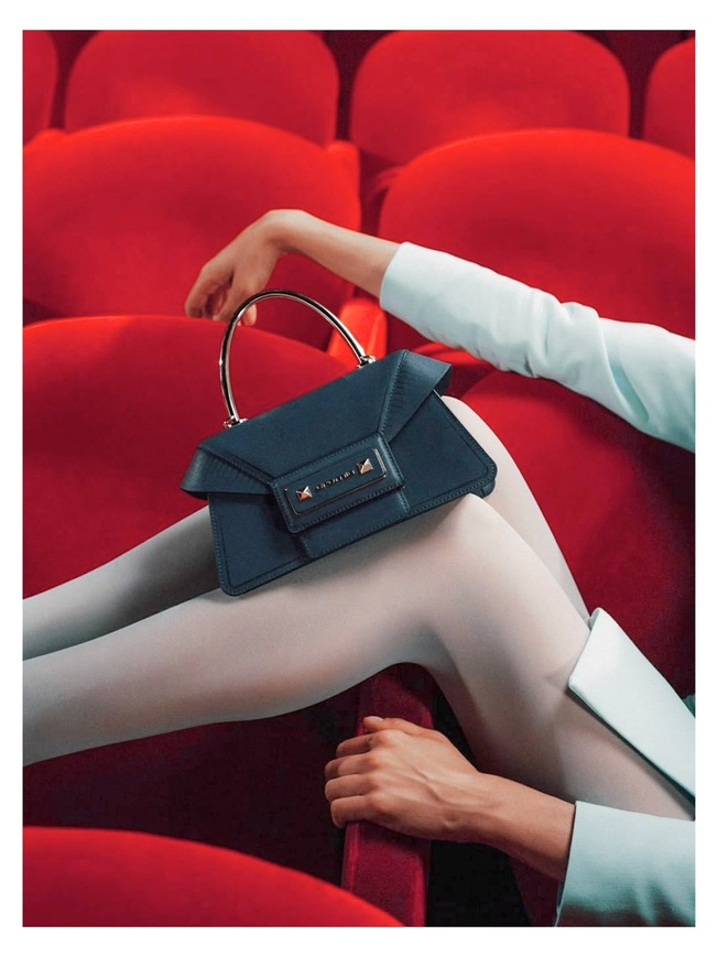 Миниатюрный сэтчел из плотной кожи с полукруглой ручкой коллекции 